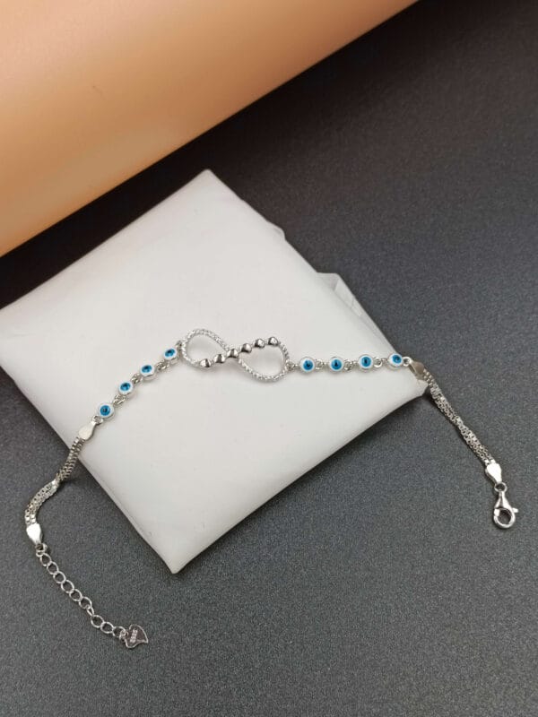 Evil Eye Infinity Bracelet with Round Charm