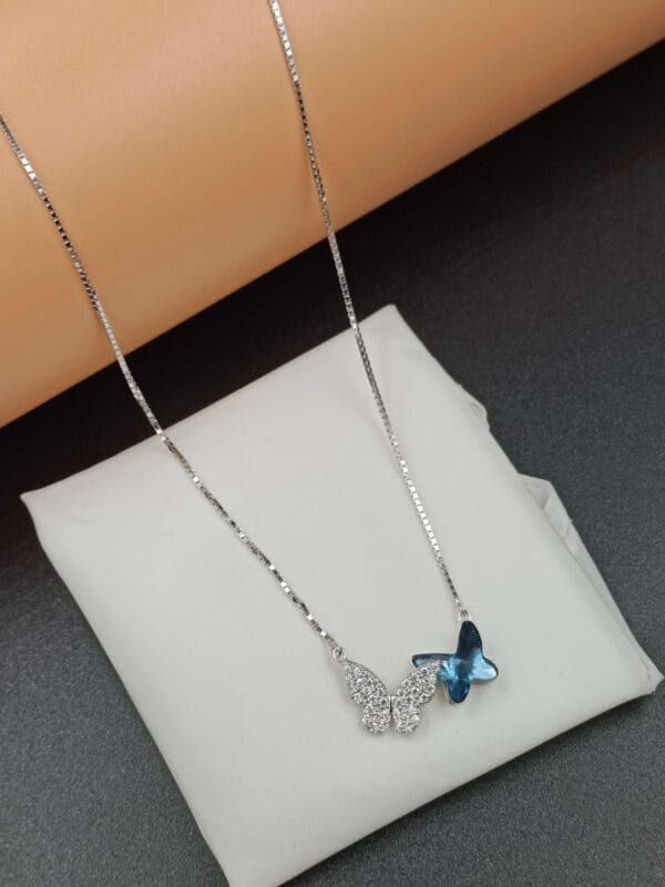 Elegant Butterfly Chain with Blue Gemstone