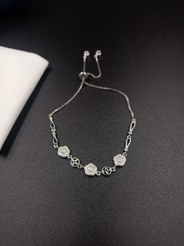 Adjustable Silver Bracelet with Flower Charms