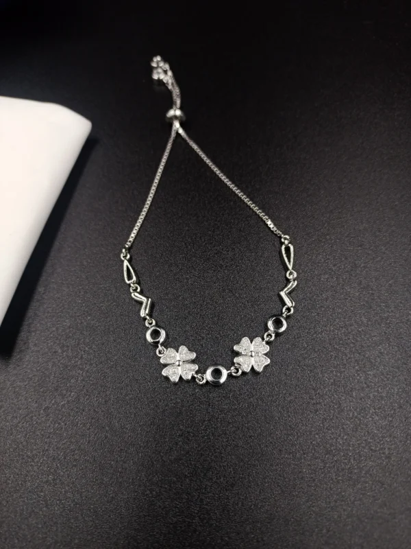Adjustable Silver Bracelet with Clover Charms