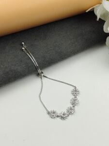 Floral Adjustable Silver Bracelet with Daisy-Inspired Motifs by Mona Silver